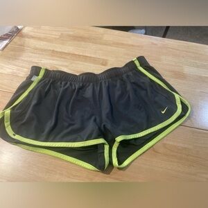 Nike Dri- fit athletic shorts in size Large.black in color w/ neon yellow